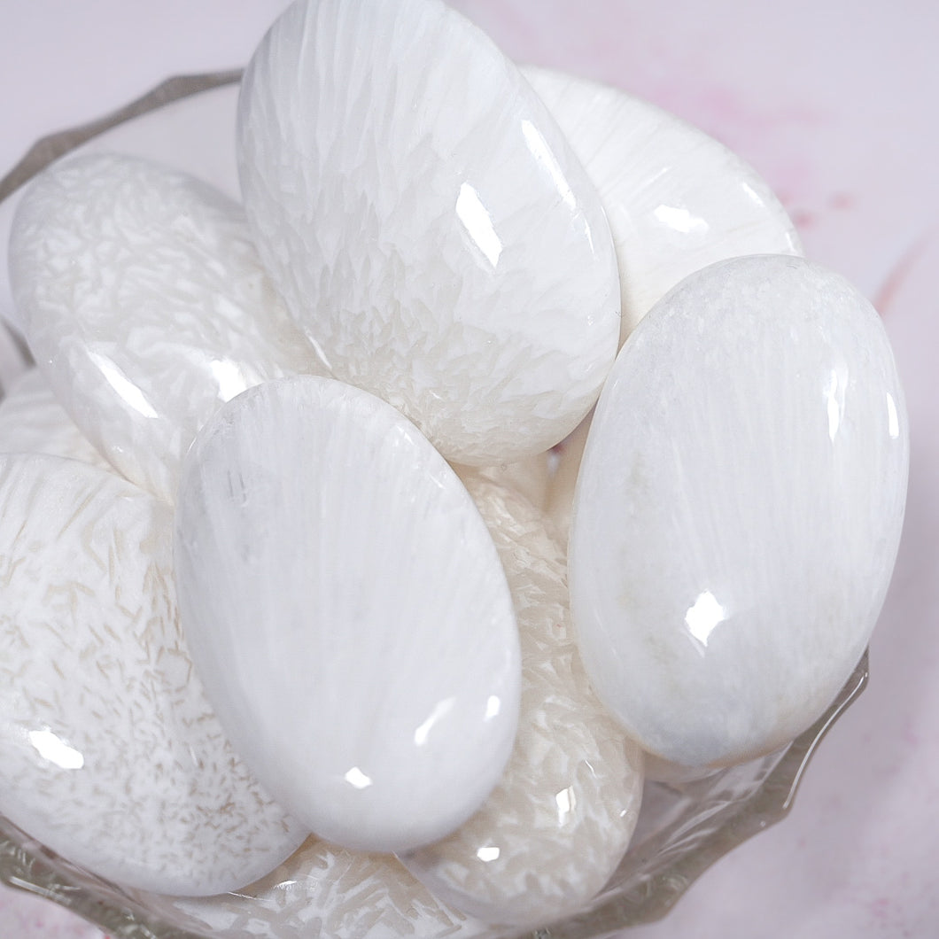 white scolecite palm stones