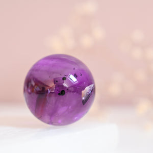 AAA grade amethyst sphere with hollandite inclusions (b)